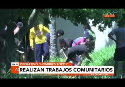 Hombres  Topos hacen tareas comunitarias